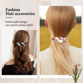 Mistofu on model French twist, creates a refined updo