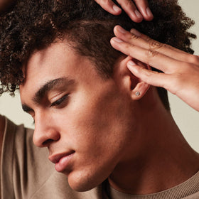MITCH being applied to hair to demonstrate control and styling benefit