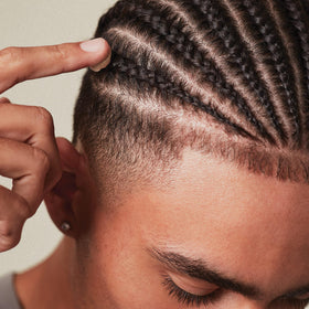 Man with pompadour styled using MITCH pomade showing high shine
