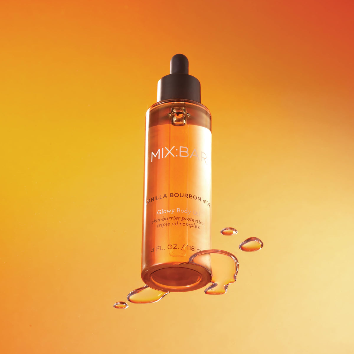 MIX:BAR bottle pouring oil from dropper highlighting silky texture