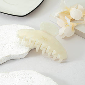 Mixcbe acetate close-up showing non-slip teeth and durable texture benefit