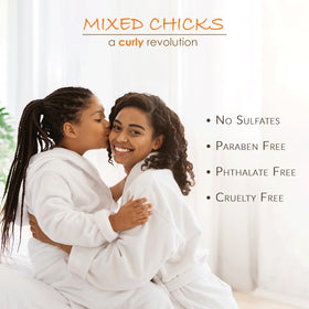 Mixed Chicks application in bathroom on child’s wet hair demonstrating easy detangling
