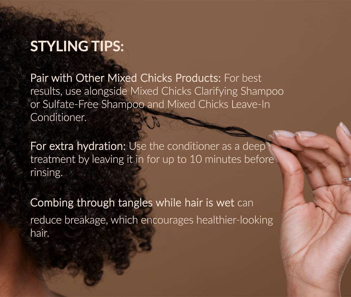 Mixed Chicks applying conditioner to curly hair to demonstrate detangling advantage