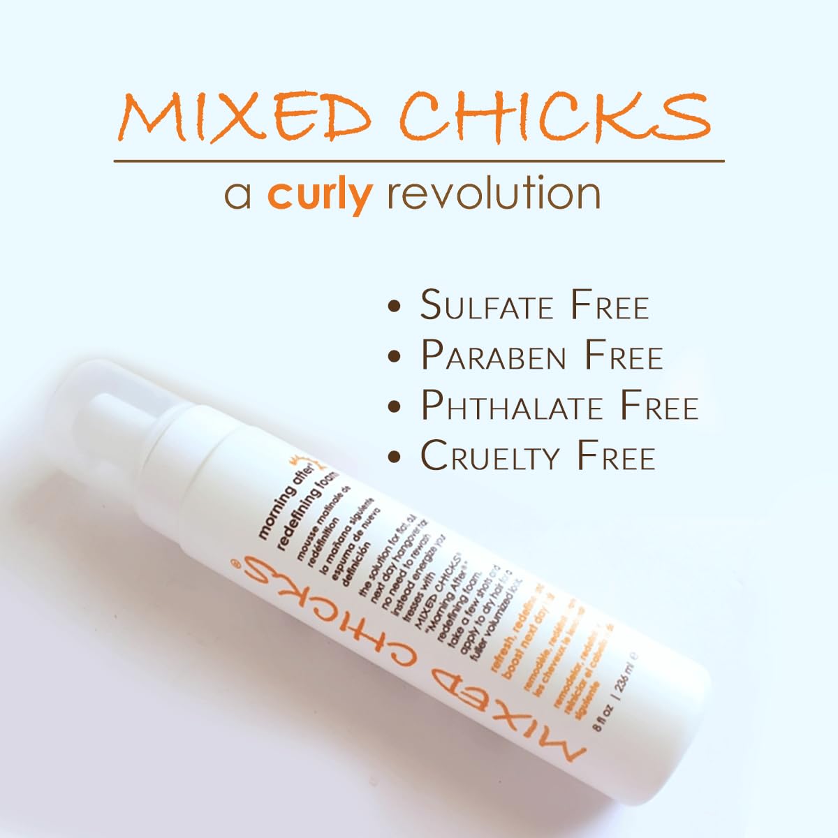 Mixed Chicks foam being applied to dry hair to restore volume and definition