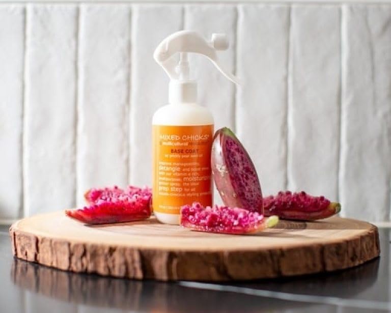 Mixed Chicks bottle on bathroom shelf in a styled routine setting for everyday use