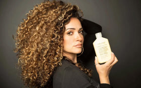 Mixed Chicks bottle on styling shelf in bathroom showing daily use benefit