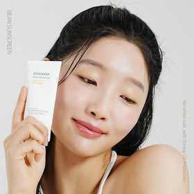 mixsoon tube dispensing sunscreen, shows smooth non-greasy application