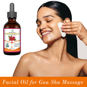 MMPANG applying oil to hair ends to reduce breakage and frizz