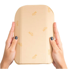 M&D ab board placed inside compression garment for discreet support