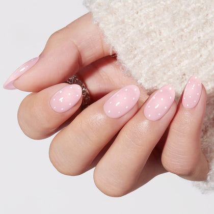 modelones front packaging showing pink polka dot nails and kit benefits