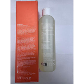 modelones bottle beside a ruler showing compact 8 fl oz size for travel convenience
