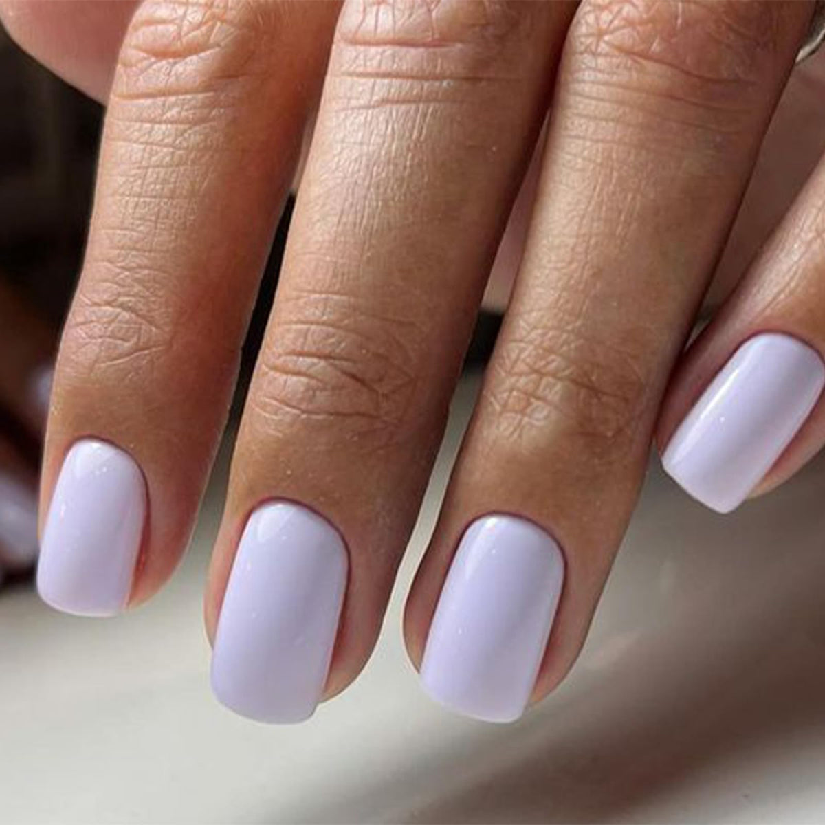 modelones texture closeup highlighting glossy neon purple finish and scratch resistance