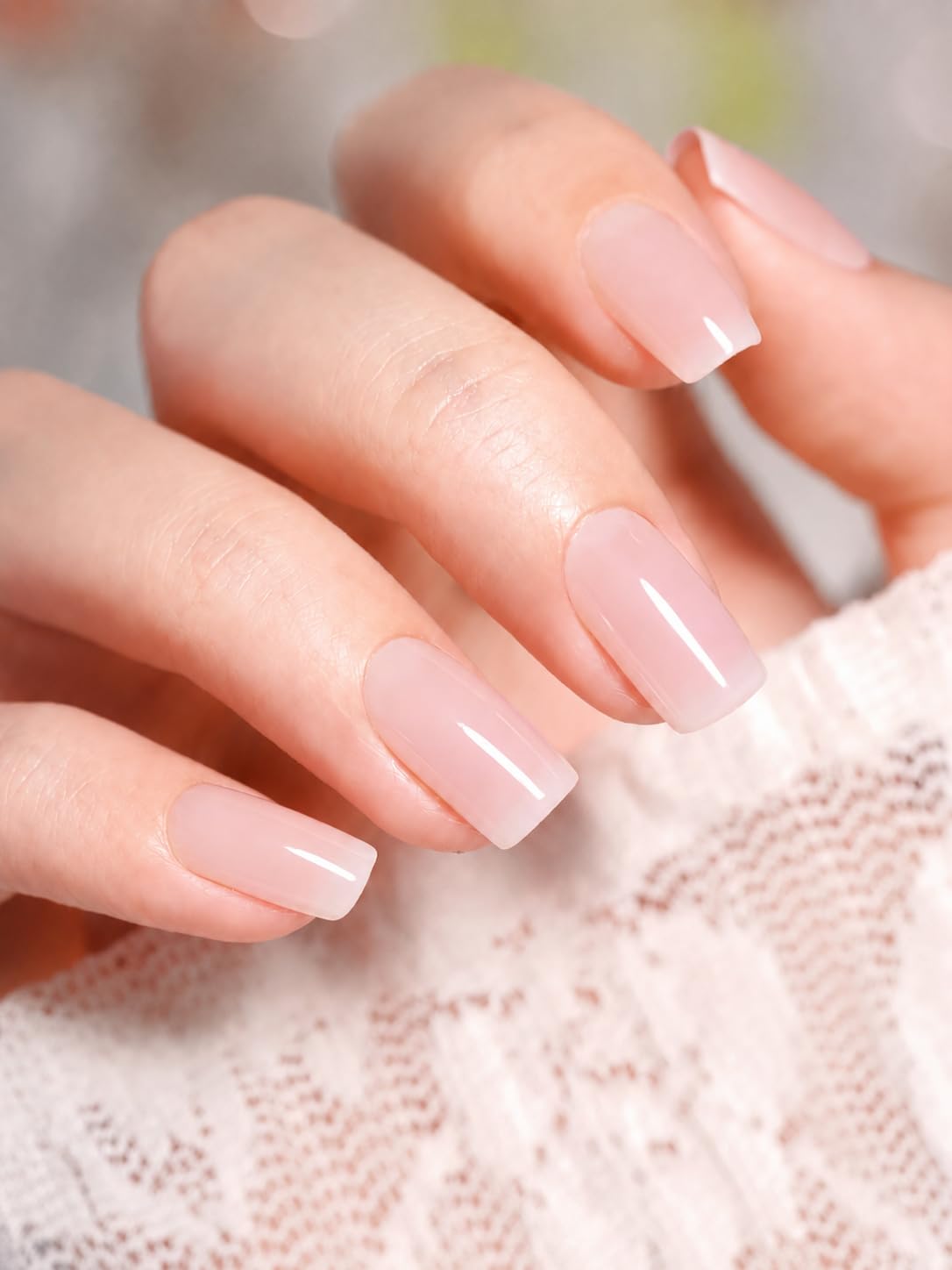modelones texture swipe on fingernail demonstrating thin coats and glossy finish benefit