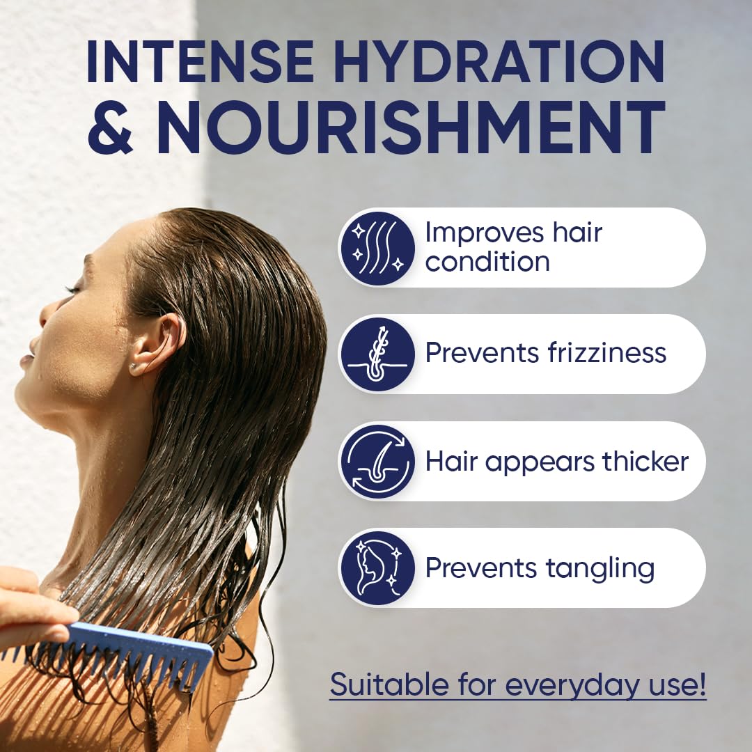 Moerie being applied in shower to mid-lengths demonstrating easy at-home use