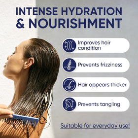 Moerie being applied in shower to mid-lengths demonstrating easy at-home use