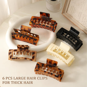 Molizummy clips packed in a purse, ideal travel-ready hair accessory set