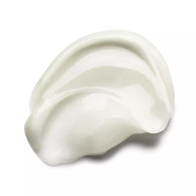 Molton Brown conditioner texture close-up illustrating creamy slip for easy detangling