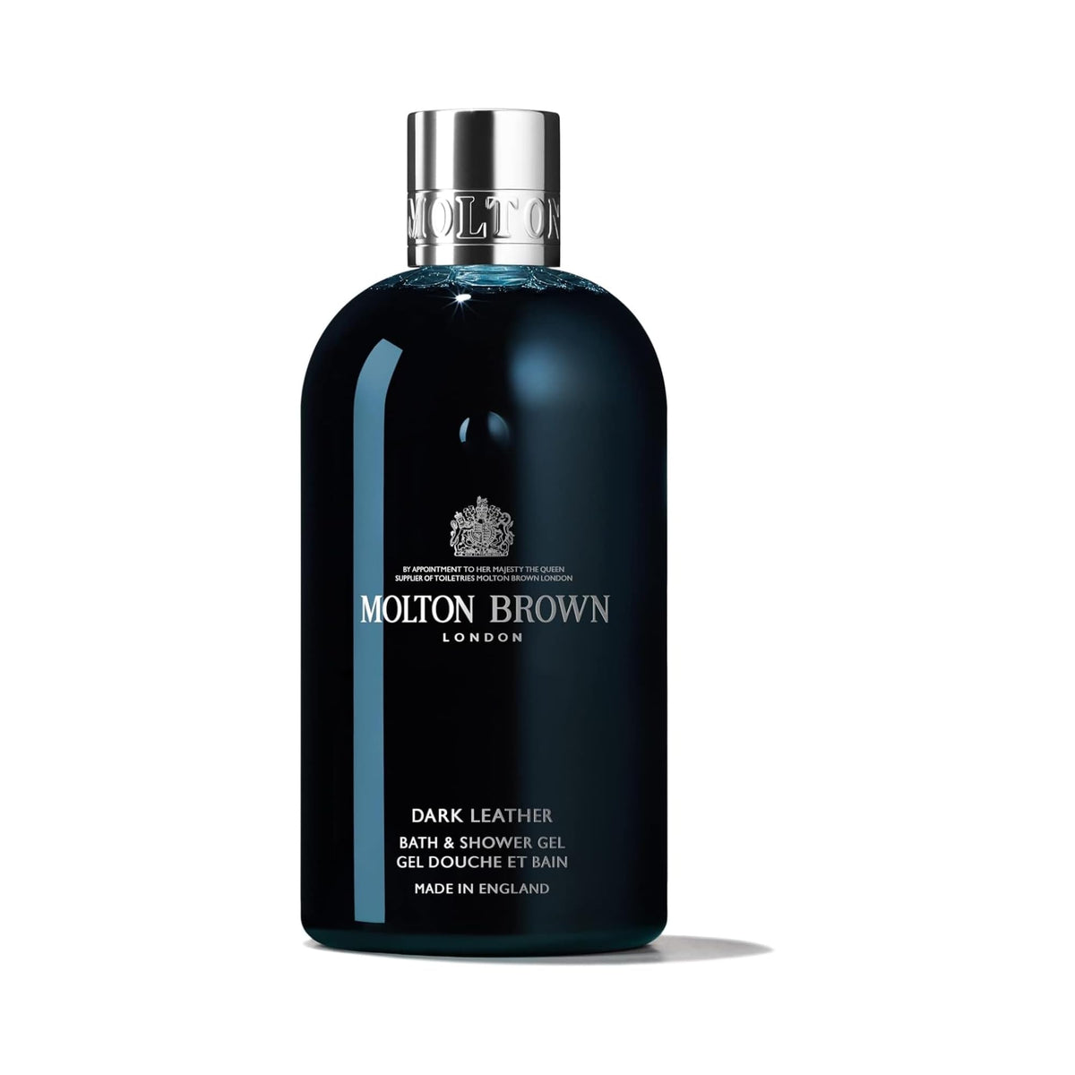 Molton Brown front bottle view showing elegant packaging and bold woody scent