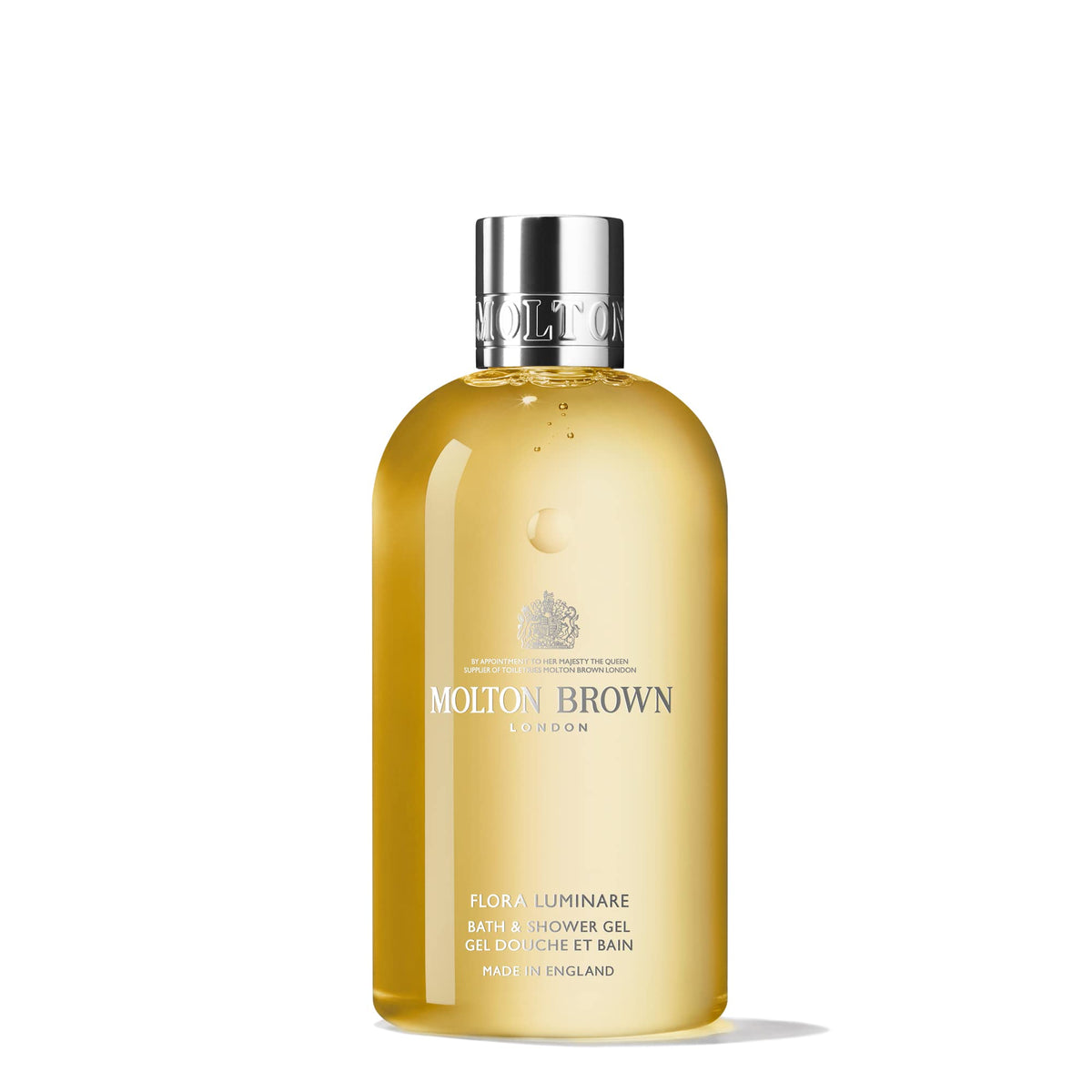 Molton Brown Flora Luminare front bottle showing label and elegant packaging benefit: clear product identity