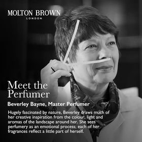 Molton Brown hand wash in use at sink, illustrates easy pump dispensing and fresh scent