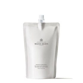 Molton Brown refill pouch front view showing branding and citrus scent benefits