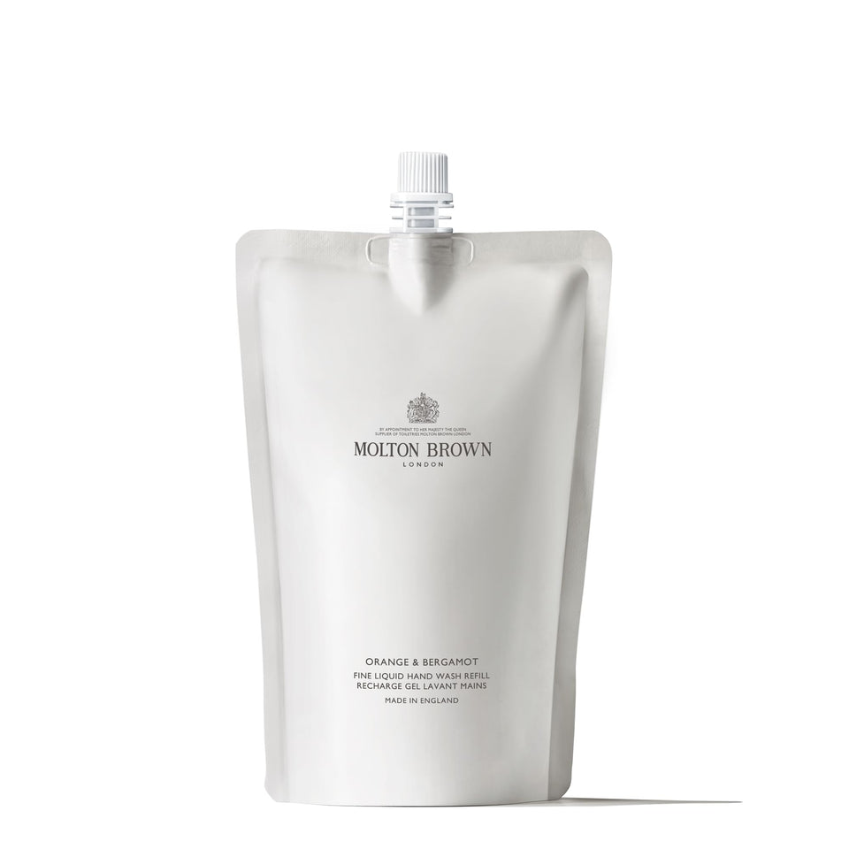 Molton Brown refill pouch front view showing branding and citrus scent benefits