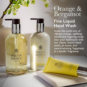 Molton Brown label detail with pump, highlights fragrance notes and premium finish