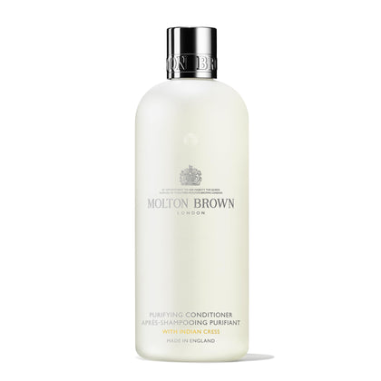Molton Brown front bottle view showing label and elegant packaging for premium gifting