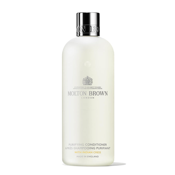 Molton Brown front bottle view showing label and elegant packaging for premium gifting