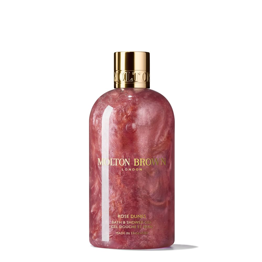 Molton Brown Rose Dunes front bottle showing shimmering amber-rose scent and luxurious cleanse