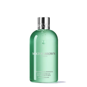 Molton Brown front bottle showing fresh mint scent and premium packaging benefit
