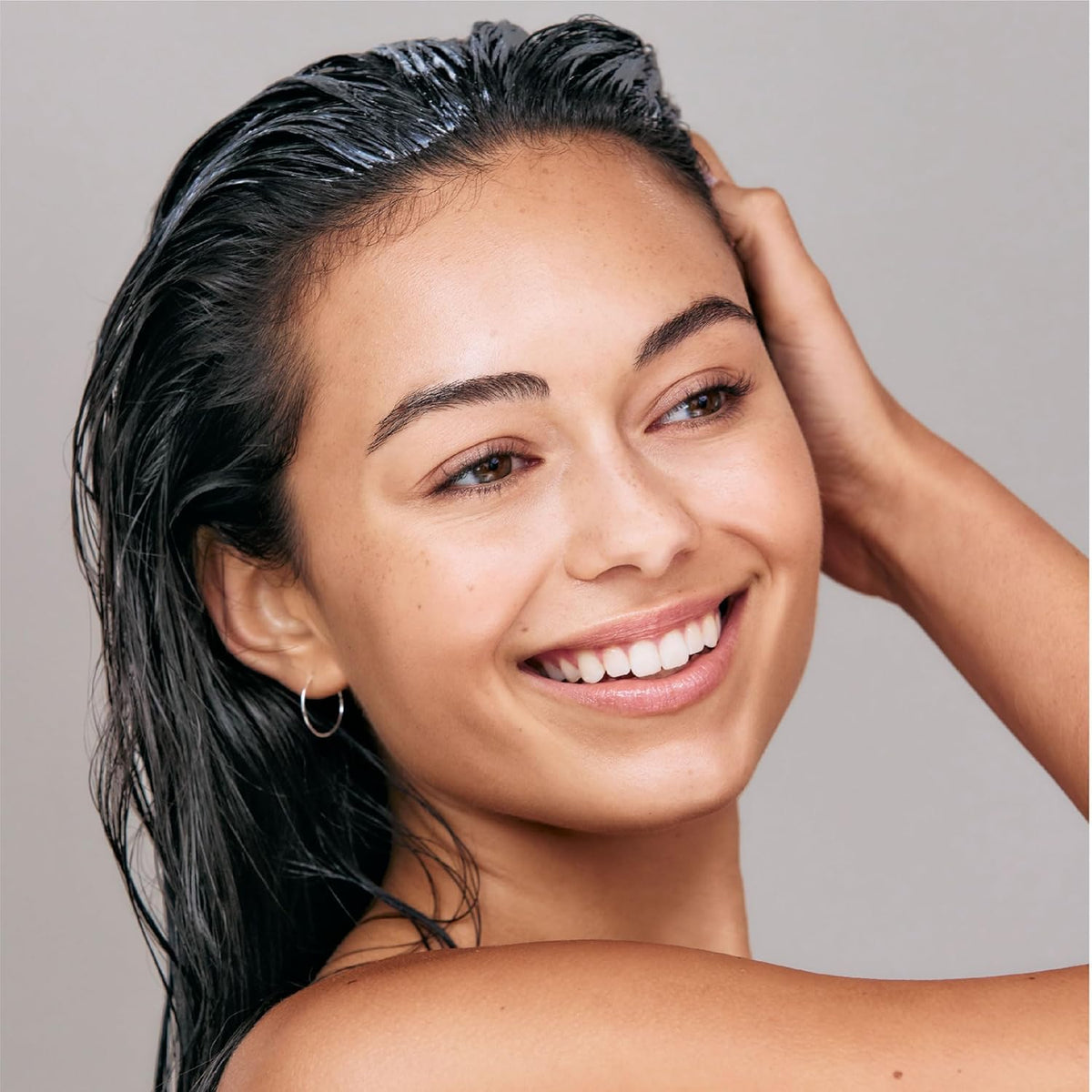 MONAT label close-up highlighting ingredient list and clean-beauty promise benefit