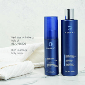 MONAT product being applied to hair demonstrating detangling and smooth finish benefit