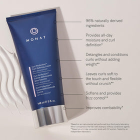 MONAT application on damp hair demonstrating curl activation and frizz control