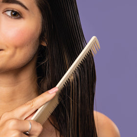 MONAT IR staged on bathroom shelf conveying premium daily routine