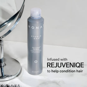 MONAT mist spraying midair demonstrating lightweight, buildable hold