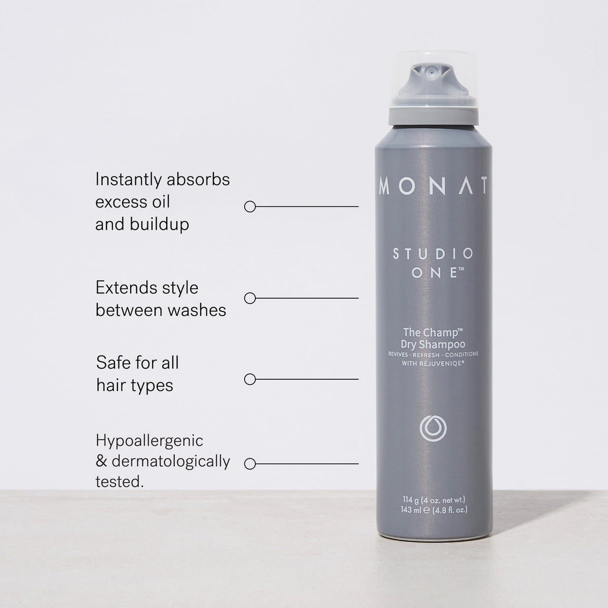 MONAT The Champ sprayed onto roots demonstrating quick oil and odor absorption