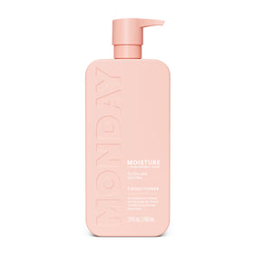 MONDAY HAIRCARE bottle front view showing product benefits and sleek design