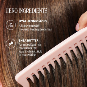 MONDAY HAIRCARE moisture bottles in hand showing travel-size convenience