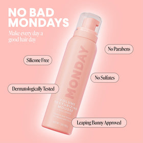 MONDAY HAIRCARE size comparison in hand to show 7 oz bottle portability