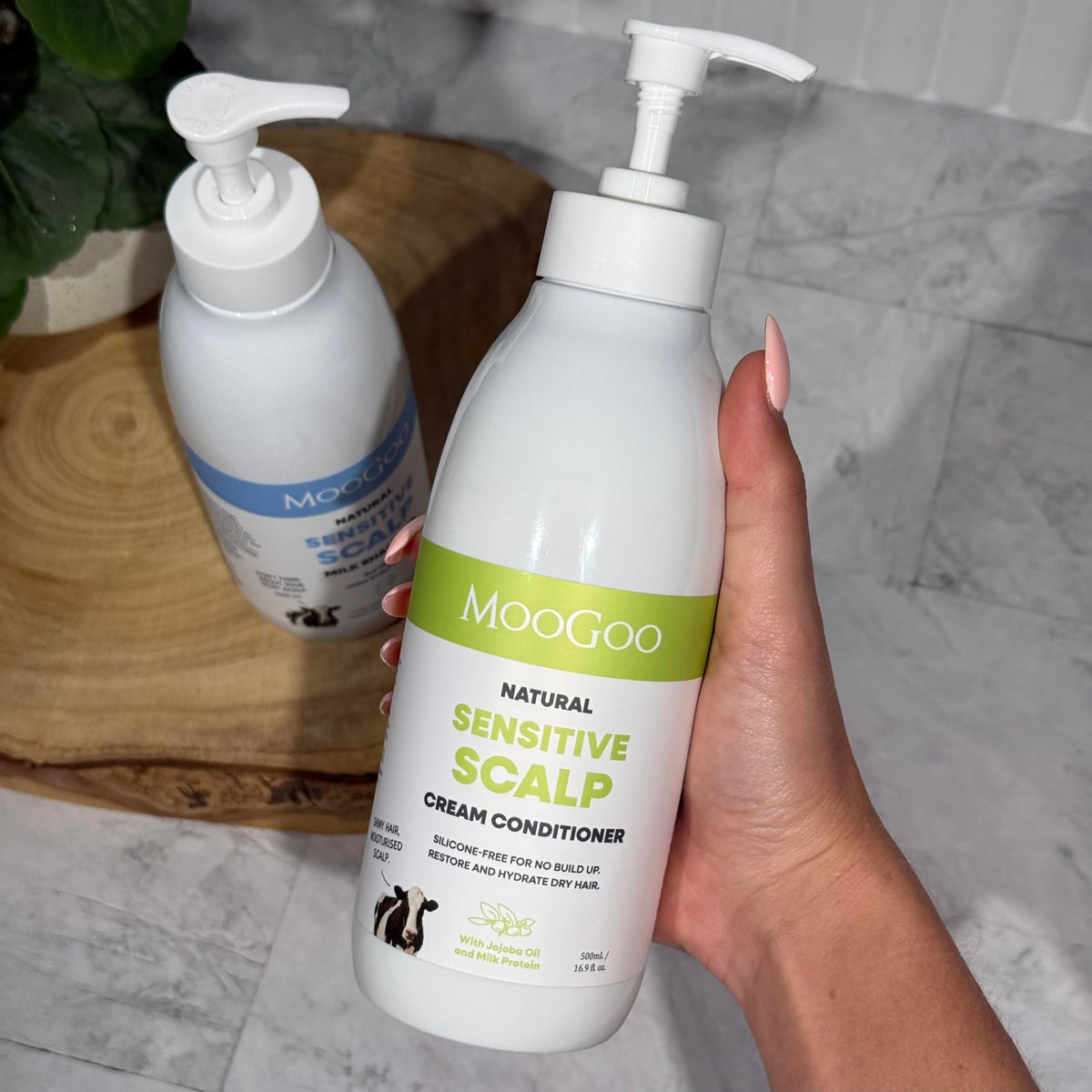 MooGoo Cream Conditioner texture close-up illustrating lightweight moisturizing benefit