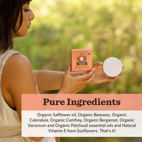Moon Valley Organics moon melt warming in hand for quick portable moisturizing