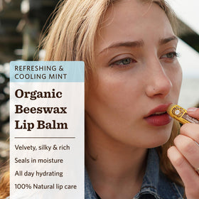 Moon Valley Organics balm sticks partially extended showing twist-up applicator and labeling