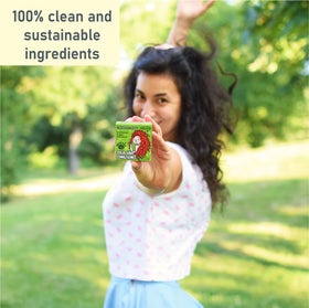 Morava conditioner bar smoothed along curly hair lengths showing improved manageability benefit