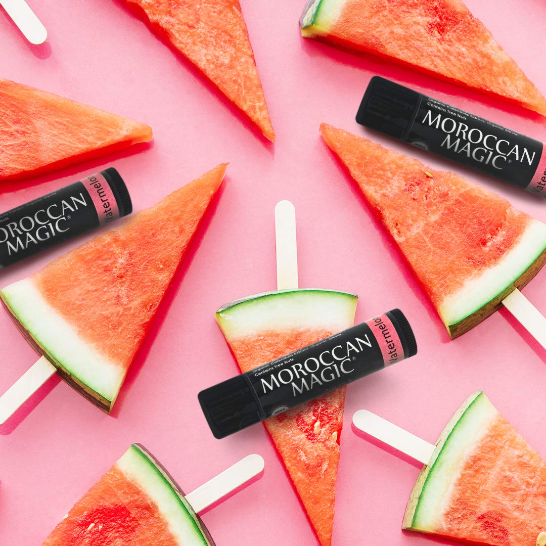 Moroccan Magic tube beside lipstick showing compact size and versatile use