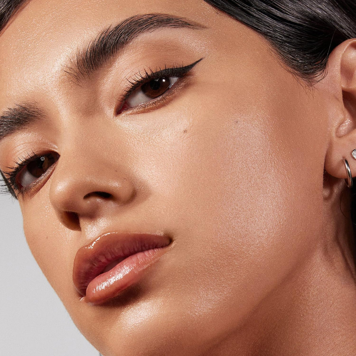 Morphe Lightform texture droplet showing dewy consistency and blendable coverage