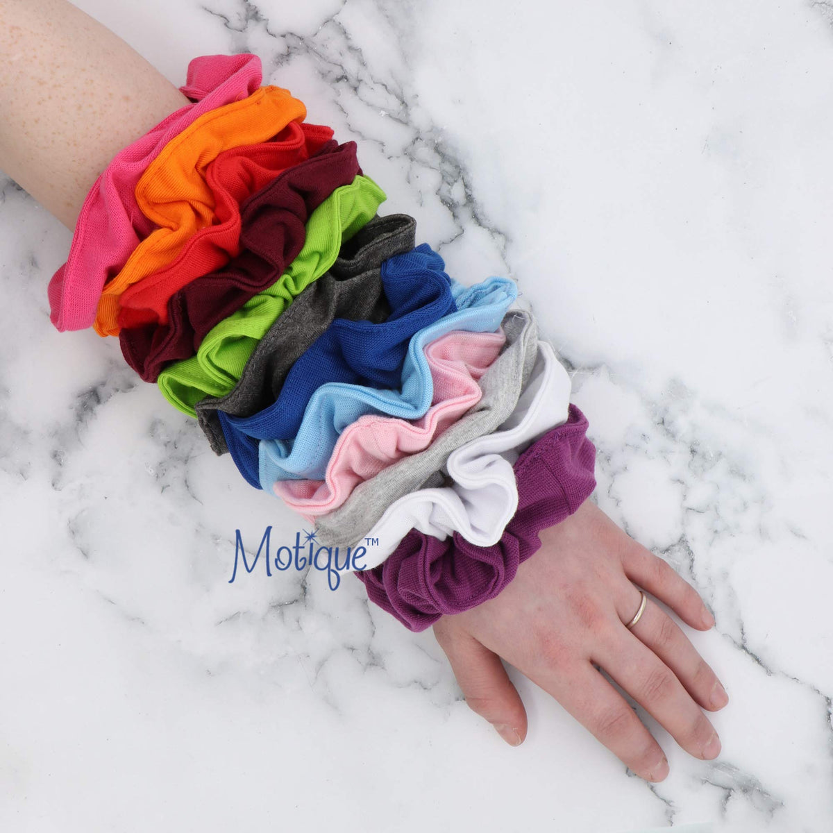 Motique Accessories scrunchie worn in ponytail, offers secure everyday styling