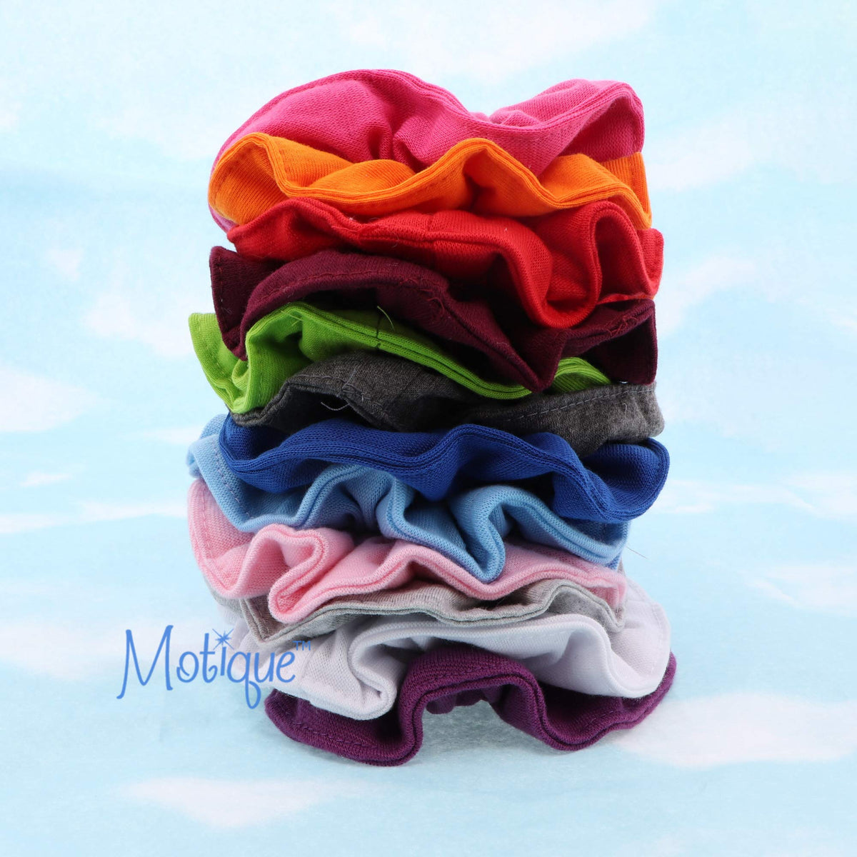 Motique Accessories scrunchies stacked in a drawer, convenient storage and extras