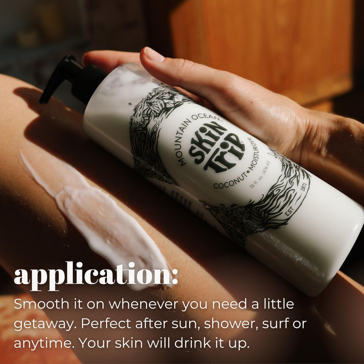 Mountain Ocean applying lotion to hand highlighting smooth hydration benefit