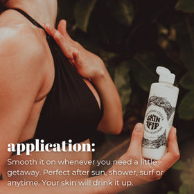 Mountain Ocean tube next to hand to demonstrate 8 oz size and portability